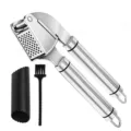 Stainless steel garlic press set with silicone peeler tube and cleaning brush for kitchen. - Garlic Press Three-Piece Set (Color Box)