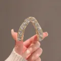 Détail de pince à cheveux en strass étincelant en forme de V, élégante barrette en métal. - Style V en Strass / Or