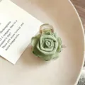 Green fabric rose hair claw clip detail, elegant floral hair accessory for women half updo. - Green