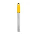Stainless steel cheese grater with ergonomic yellow handle, sharp kitchen zester tool. - Yellow