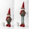 Christmas telescopic snowman doll detail showing adjustable height from 44cm to 58cm plush. - Snowman Style