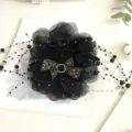 Oversized black mesh peony hair claw clip with rhinestones and pearl tassels for women. - Black