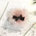 Oversized pink peony hair claw clip with dark bow and pearl decor, elegant autumn winter style. - Pink