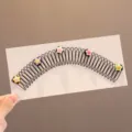 Peigne à cheveux en fil noir avec étoiles colorées pour enfants accessoire de coiffure détail - Peigne Latéral Cheveux Étoile Pentagramme