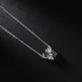 Close-up silver rhinestone LOVE pendant necklace showing sparkling crystal details and fine chain - LOVE Silver White