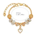 Bracciale con charms dorato con perline di cristallo e ciondolo a cuore, lunghezza 19+5cm. - 19cm / Oro