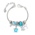 Dettaglio bracciale con ciondolo tartaruga in cristallo blu serie oceano in lega. - Blu