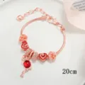 Bracciale con ciondolo fenicottero in oro rosa e perline a cuore scintillanti per donna. - 18cm / Rosso