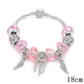 Bracciale con ciondoli in cristallo rosa acchiappasogni e ali di angelo donna in colore argento - 18cm / Rosa