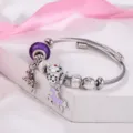 Edelstahl DIY Bettelarmband mit lila Perlen und niedlichen Pferd Anhängern für Damen Mode. - Lila Einhorn