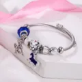 Edelstahl DIY Bettelarmband mit blauen Kristallperlen und niedlichen Pferd Anhängern. - Blaues Einhorn