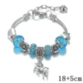 Affascinante bracciale componibile argentato con perle di cristallo blu e un ciondolo. - Catena di estensione 14+5cm / Blu