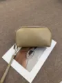 Beige half-arc cosmetic bag with wrist strap, portable travel PU leather pouch for women. - 22*5.5*12CM / Apricot