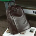 Stylish genuine leather women's casual backpack with soft texture, large capacity, and front pocket. - 35x32x17cm / Coffee