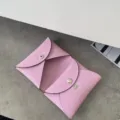 Pink genuine leather envelope coin purse and card holder with elegant snap button design. - Pink