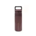 Close-up detail of a portable EDC aluminum alloy sealed storage canister for outdoor camping. - Coffee