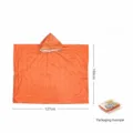 Essential emergency rain poncho detail, lightweight thermal survival gear for outdoor camping. - Orange