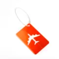 Etiquette de bagage en aluminium orange vif avec decoupe d'avion et attache fil. - Orange