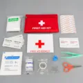 Kit di Pronto Soccorso di Emergenza 13 Pezzi Borsa di Sopravvivenza Casa Auto Esterno - Rosso