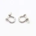 Close-up of silver metal bow shackles, ideal detail shot for paracord DIY craft accessories. - Large Belly Buckle