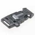 Black plastic tactical survival buckle detail shot with metal striker slot for paracord gear - Black