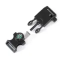 Closeup view of the multi-functional survival buckle featuring a built-in compass and flint. - Black