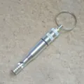 Outdoor survival aluminum alloy whistle with key ring and waterproof compartment, portable gear. - Silver