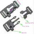 Multifunctional tactical survival buckle with fire starter knife and whistle for camping gear. - Black