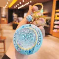 Cute blue UFO luminous keychain with dinosaur print, shiny crystal ball bag pendant and ring. - Blue