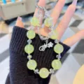 Crystal beaded phone charm and bag hanging chain with cute bow pendant for women. - Yellow Beaded