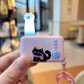 Detail view of the cute cat themed light up keychain with paw design and fun printed graphic. - Pink Cat Paw Jump Light