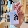 Cute pink decompression toy keychain with cat pattern and LED light, perfect for cute bag pendant. - Pink Black Cat Jump Light