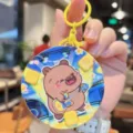Cute cartoon brown bear game console keychain, lovely backpack pendant toy for kids. - Yellow Guitar Capybara