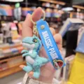 Porte-clés dinosaure Jurassic Park pendentif sac à dos dessin animé mignon cadeau - Velociraptor Bleu Clair