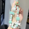 Cute cartoon macaron beaded phone chain and bag charm with cute camera and letter pendants. - Green