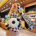 Creative cute checkered bear camera keychain and bag charm with strap, trendy accessory. - Black