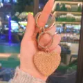 Portachiavi cuore strass oro rosa, ciondolo borsa in cristallo brillante e accessorio chiave auto. - Champagne