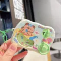 Cute cartoon capybara mini racing game keychain, fun interactive toy for kids and gift. - Green Vacation Capybara