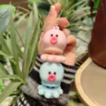 Cute squeeze octopus keychain charm for backpack and bag decoration, fun stress relief toy. - Pink+Blue