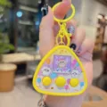 Cute yellow triangular electronic pet toy keychain with cartoon cats and three buttons. - Yellow Cat