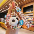 Cute grid bear projection camera keychain toy, creative mini camera bag pendant light. - Khaki