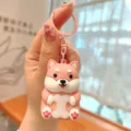 Close-up detail of the cute pink Shiba Inu glowing keychain pendant with metal ring hook. - Pink Shiba Inu