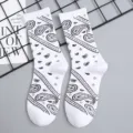 White cotton mid-tube socks featuring a classic black paisley bandana pattern for streetwear. - One Size Single Socks (Sizes 37-43) / White #1