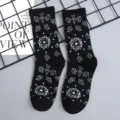 Black mid-tube socks featuring trendy white woven floral and geometric patterns for street wear. - One Size Single Socks (Sizes 37-43) / Black #2
