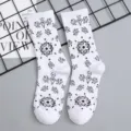 Trendy black and white mid-tube cotton socks with streetwear floral print for daily wear. - One Size Single Socks (Sizes 37-43) / White #2