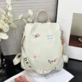 Fashion nylon backpack with floral embroidery and large capacity for women daily use. - White