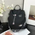 Women black backpack casual large capacity nylon travel school bag with nice embroidery - Black