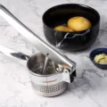 Stainless steel potato ricer heavy duty kitchen tool for making smooth mashed potatoes - Potato Masher (PP Bag Packed)