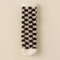 Cozy fuzzy checkerboard mid-calf socks in black and cream, soft coral fleece winter sleep socks. - One Size / Black White Grid