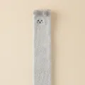 Grey coral fleece fluffy warm winter socks with cute embroidered face and pompom ears design. - One Size / Gray